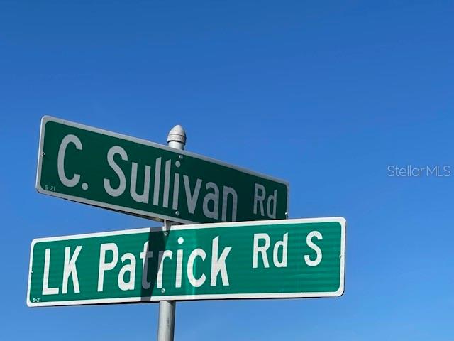 A street sign shows the names C. Sullivan Rd and LK Patrick Rd S — 0 C SULLIVAN ROAD, FROSTPROOF, FL