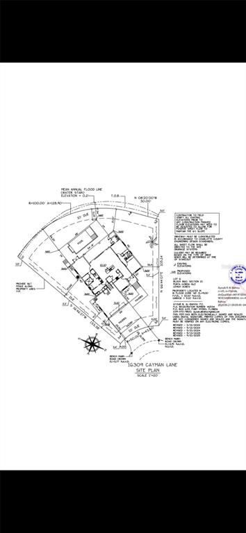 This image is a site plan for a residential property showing the house and lot layout — 16309 CAYMAN LANE, PUNTA GORDA, FL