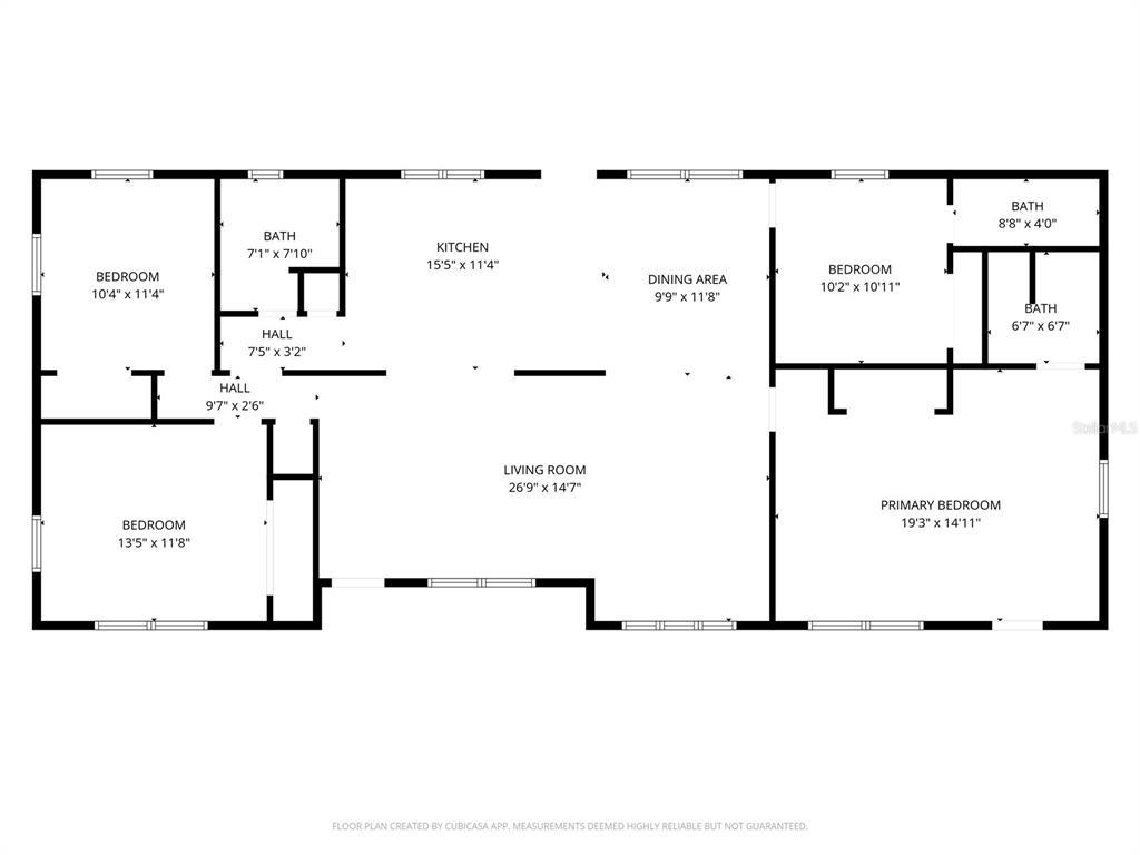 This is a floor plan showing a home with four bedrooms, three bathrooms, and a kitchen — 10945 N BOULEVARD, TAMPA, FL
