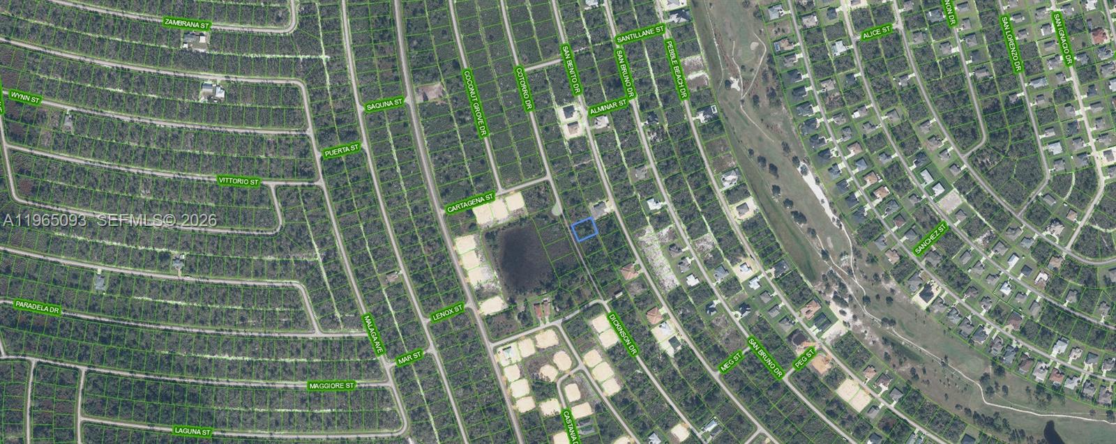 This is an aerial map showing a vacant residential lot highlighted in blue — 6857 Dickinson Drive, Sebring FL 33872, SEBRING, FL