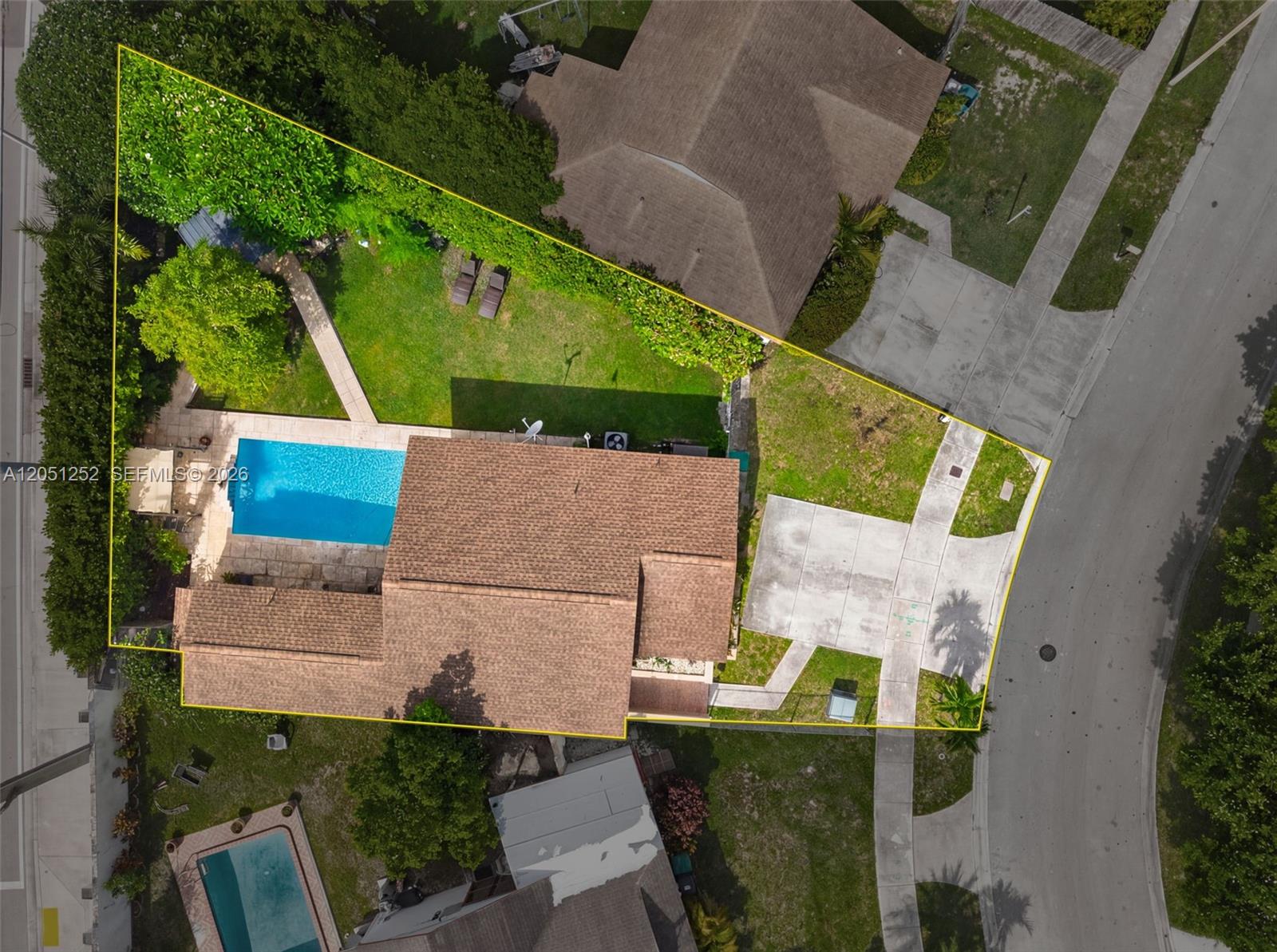 An aerial view shows a house with a swimming pool and a large backyard — 12422 SW 199th St, Miami FL 33177, MIAMI, FL
