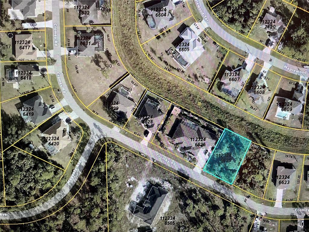 This is an aerial map showing property lot lines and parcel numbers for a residential neighborhood — LOT 25 CROMEY ROAD, NORTH PORT, FL