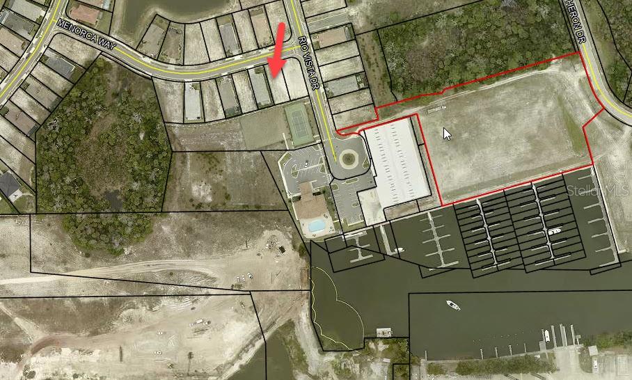 This is an aerial map showing a residential street, a marina, and a vacant lot — 4 MENORCA WAY, PALM COAST, FL