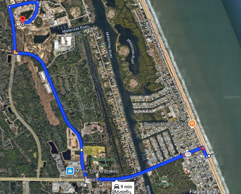 This is a map showing a driving route between a residential area and the beach — 4 MENORCA WAY, PALM COAST, FL
