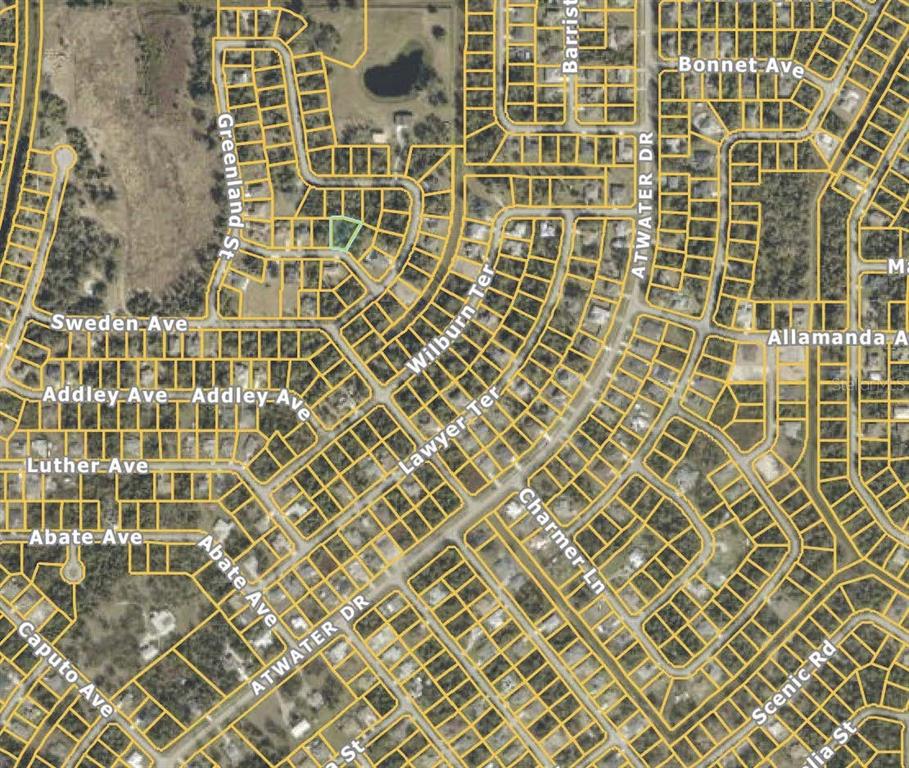 This is a satellite map view showing residential streets and property lot lines — LENMAN AVENUE, NORTH PORT, FL