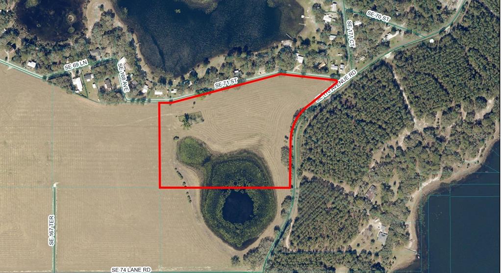 An aerial map shows a parcel of land outlined in red, featuring a central pond — TBD SE 170 AVE ROAD UNIT Tract A, OCKLAWAHA, FL