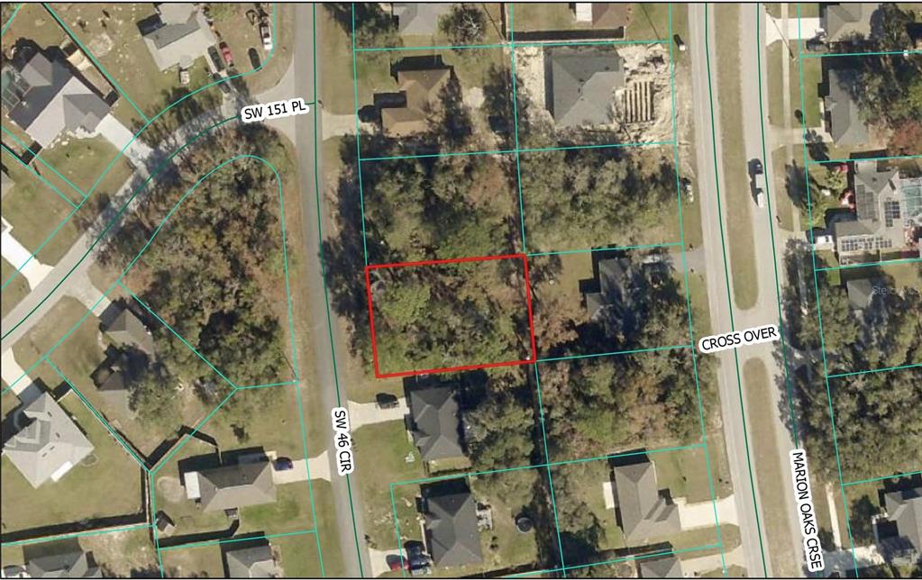 An aerial map view shows a vacant, rectangular lot outlined in red within a residential neighborhood — TBD SW 46TH CIRCLE, OCALA, FL