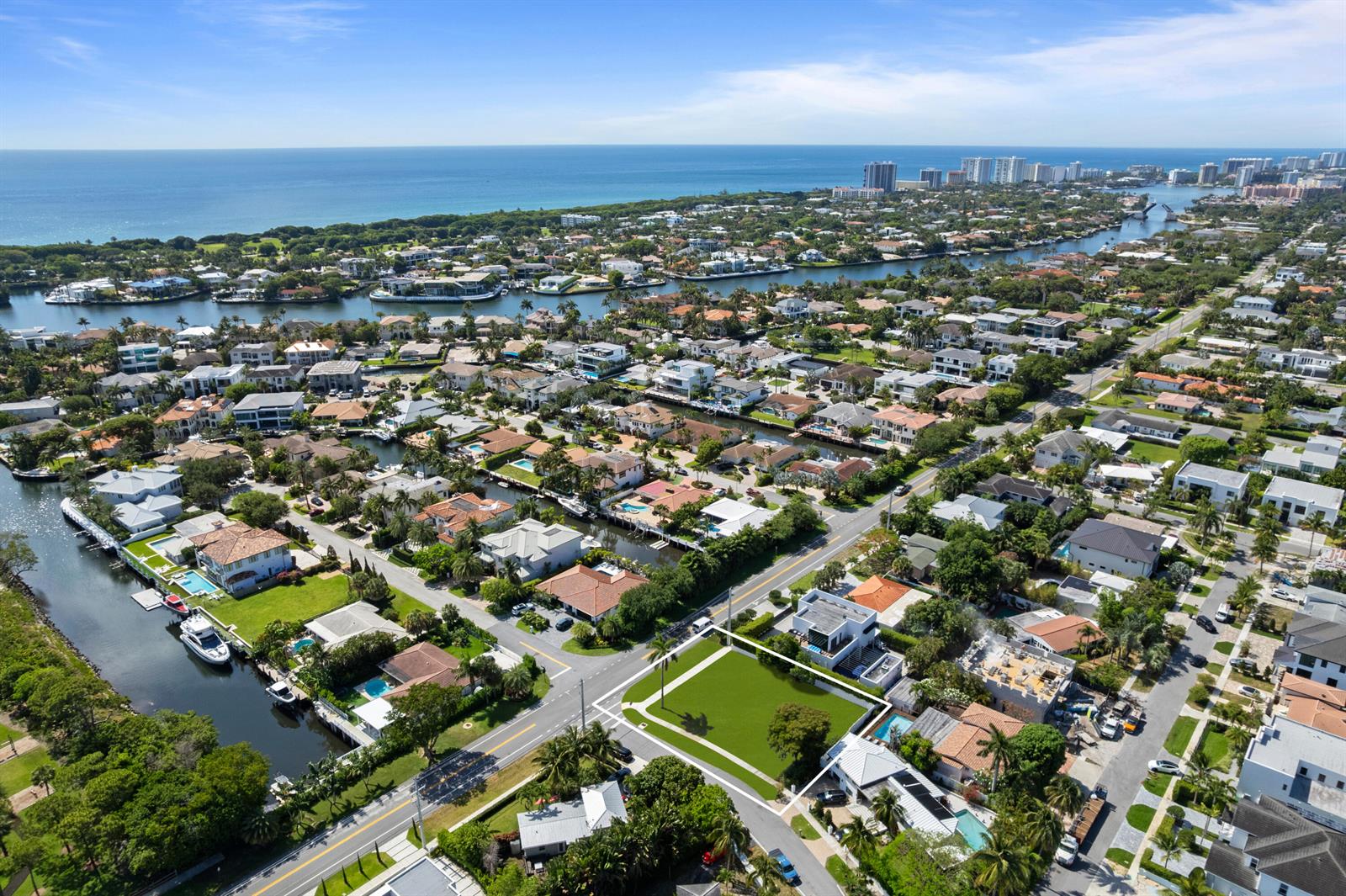 An aerial view shows a vacant rectangular lot in a waterfront residential neighborhood — 498 NE 14th Street, Boca Raton FL 33432, BOCA RATON, FL