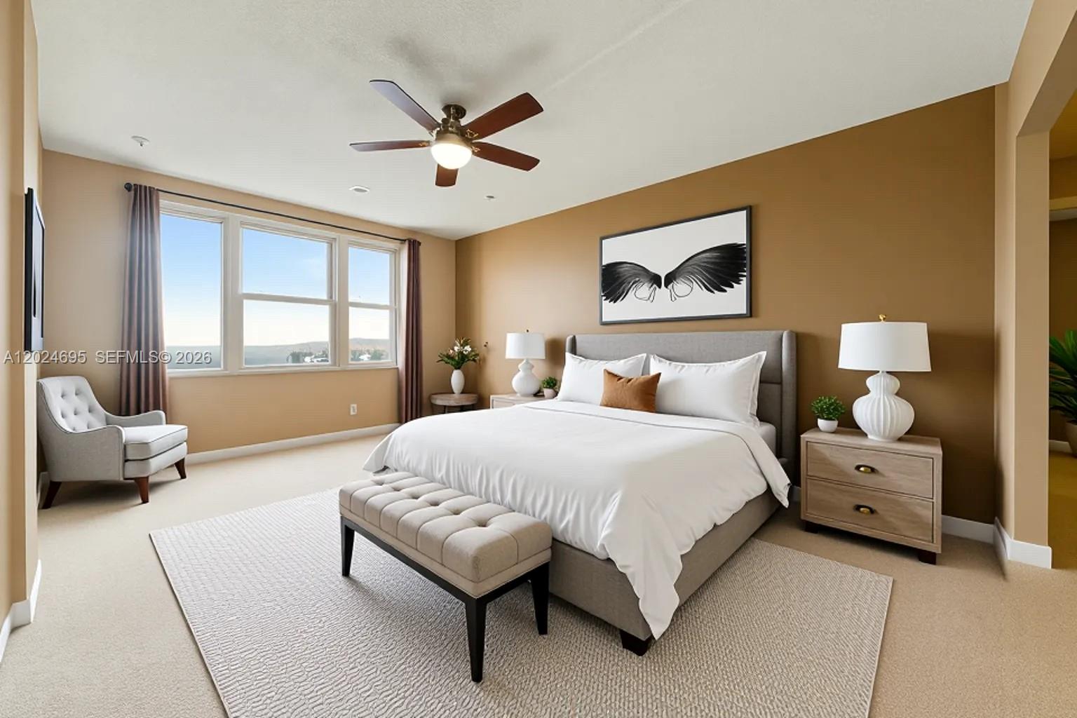A bedroom features a king-sized bed, a tufted bench, and a large window with views — 4350 Hillcrest Dr # 1016, Hollywood FL 33021, HOLLYWOOD, FL