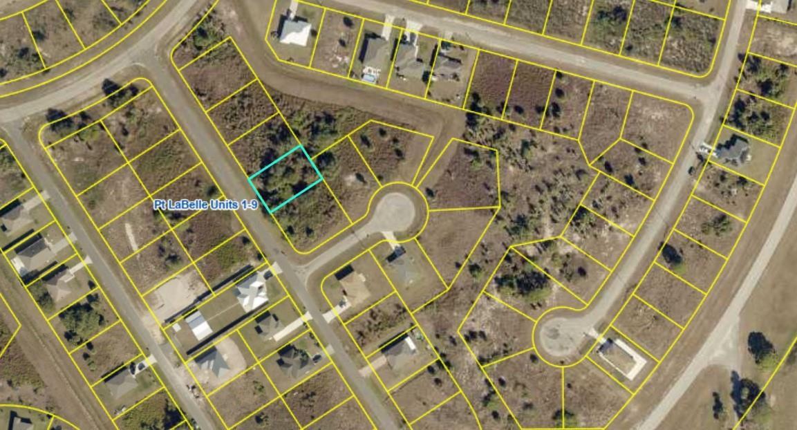 This is an aerial map showing a vacant residential lot highlighted in blue within a subdivision — 8007 Mangrove Circle, FL 33935, FL