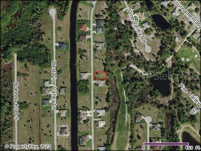 This is an aerial map view of a residential lot highlighted in red — 164 TOURNAMENT ROAD, ROTONDA WEST, FL
