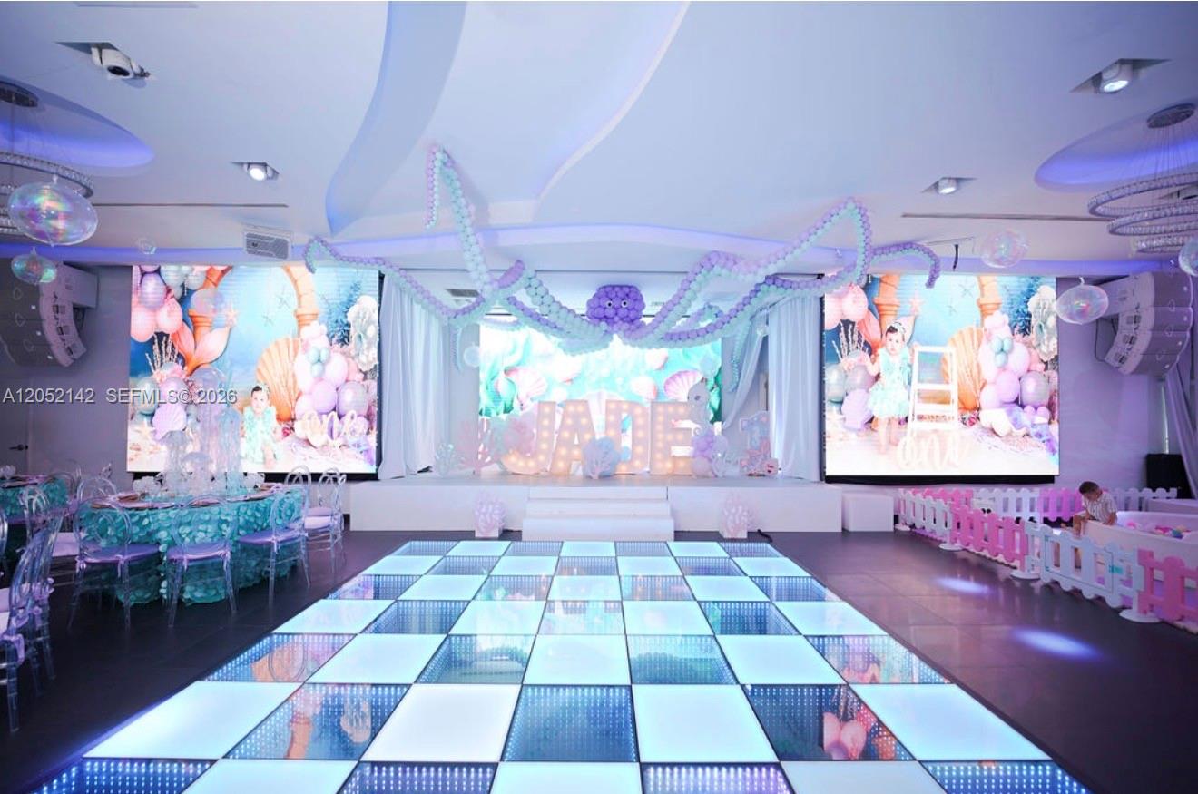 A brightly lit event space features a dance floor, stage, and mermaid-themed party decorations — 2717 SW 142nd Ave, Miami FL 33175, MIAMI, FL