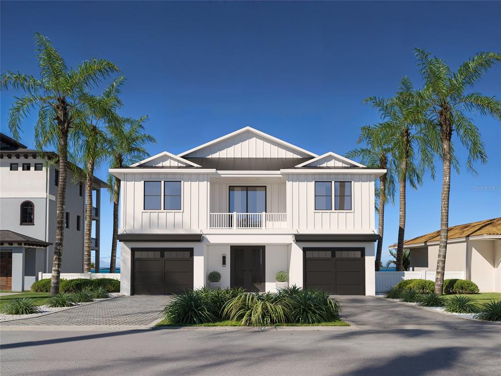This is a rendering of a two-story white house with two garages and a balcony — 17030 DOLPHIN DRIVE, NORTH REDINGTON BEACH, FL