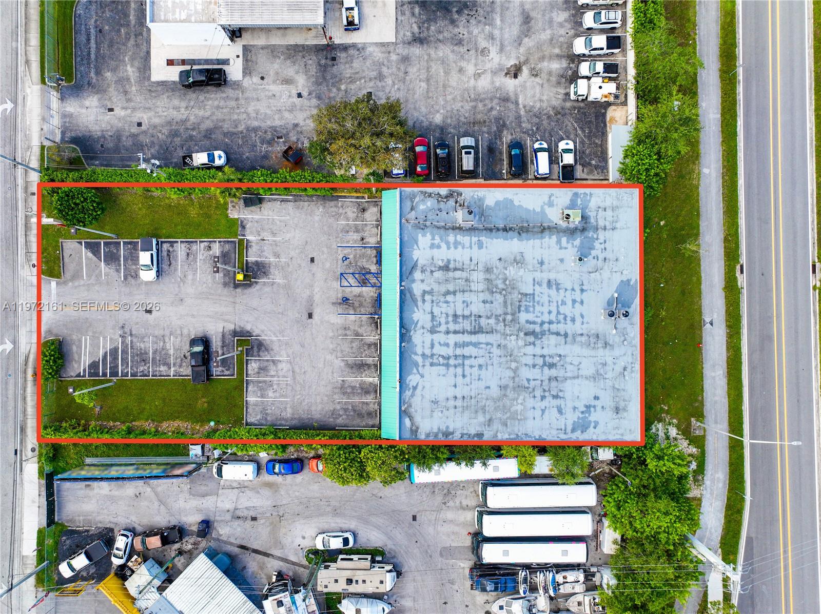 An unfinished commercial space features exposed concrete ceilings and a suspended HVAC duct system — 27332-34 S Dixie Hwy, Miami FL 33032, MIAMI, FL