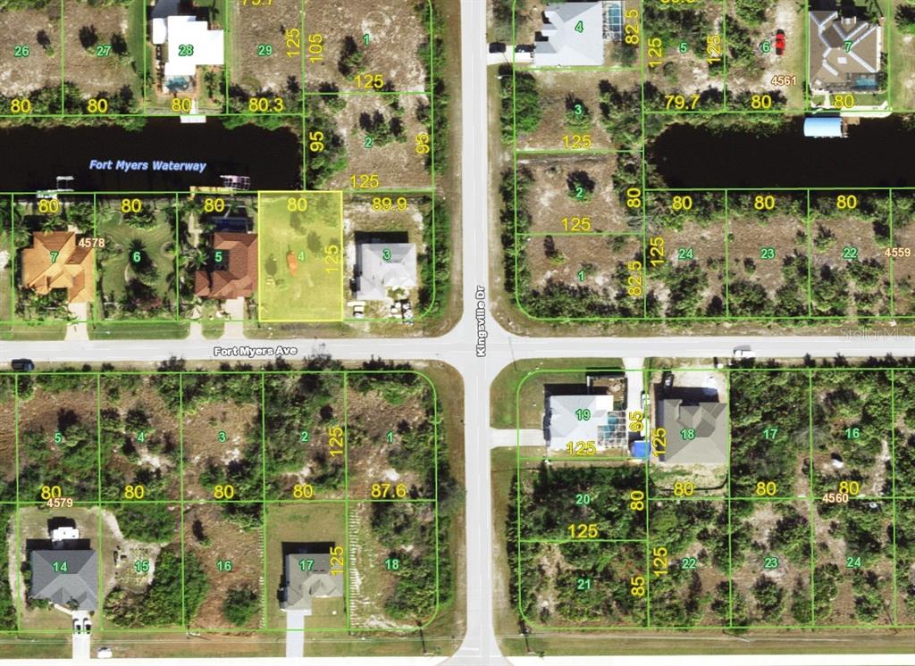 This is an aerial map showing residential lots and a waterway — 14150 FORT MYERS AVENUE, PORT CHARLOTTE, FL