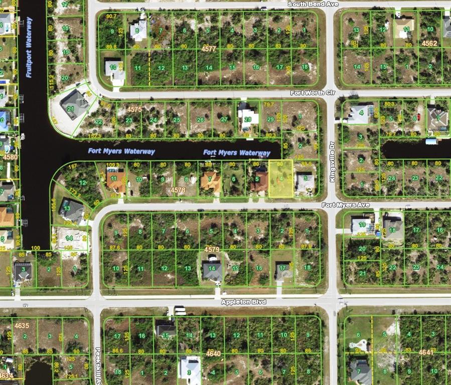 This is a satellite map showing residential lots, streets, and waterways in a neighborhood — 14150 FORT MYERS AVENUE, PORT CHARLOTTE, FL