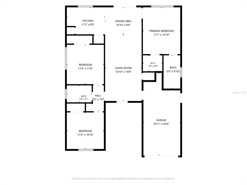 This is a floor plan showing a three-bedroom, two-bathroom home with an attached garage — 2604 W KIRBY STREET, TAMPA, FL