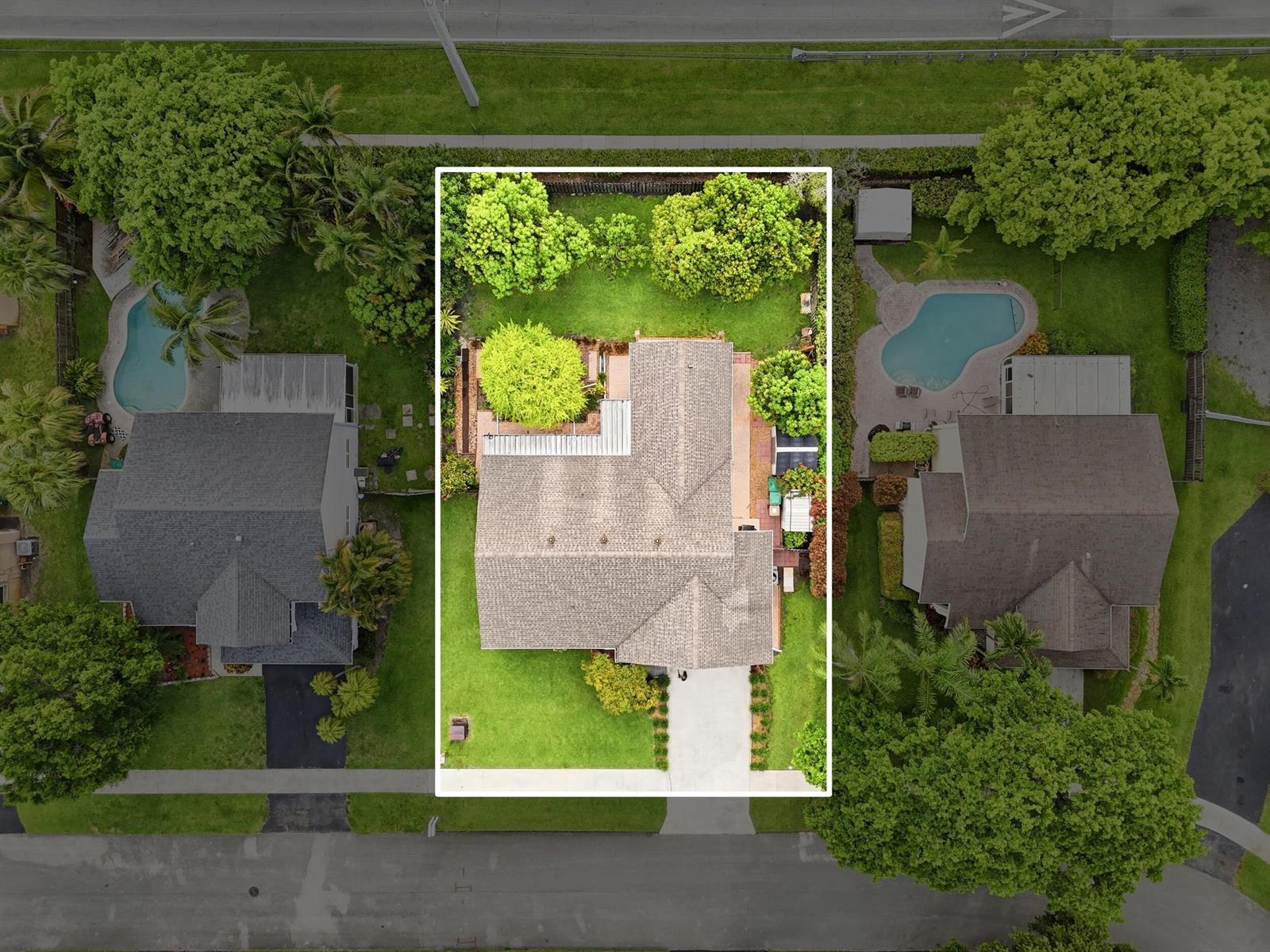 An aerial view shows a single-family home with a shingled roof and a backyard — 5787 SW 57th Way, Davie FL 33314, DAVIE, FL
