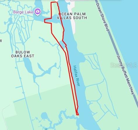 This is a map showing a property boundary outlined in red near the Halifax River — XX JOHN ANDERSON, FLAGLER BEACH, FL