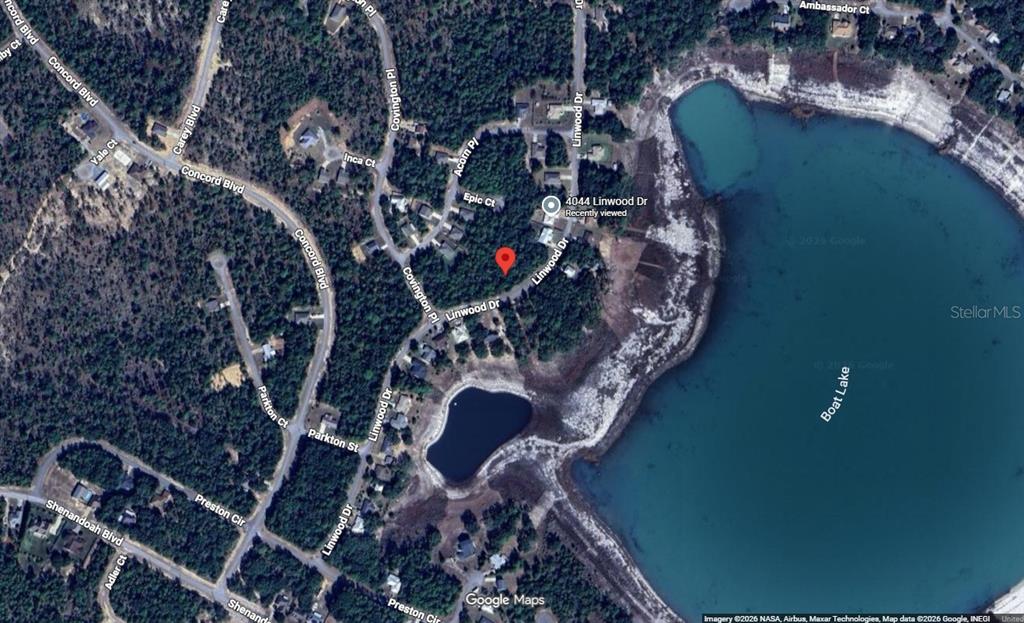 This is a satellite map view of a residential area bordering a large lake — Lot 23, Unit 19, Blk 1096 LINWOOD DRIVE, CHIPLEY, FL