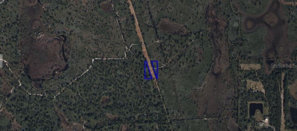 This is an aerial map showing a rectangular plot of land outlined in blue — CAPE CANAVERAL SUBD UNRECORDED, PALM BAY, FL