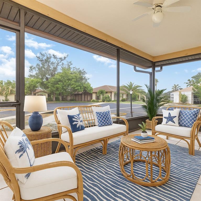 A screened-in patio features wicker furniture, a blue-and-white area rug, and views of neighborhood homes — 4152 66TH STREET CIRCLE W, BRADENTON, FL