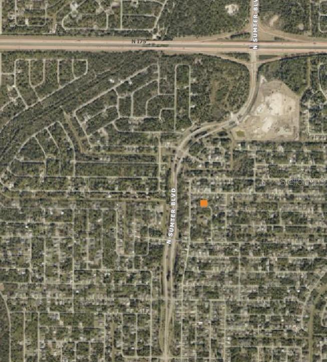 This is an aerial map showing a residential neighborhood with a highlighted property lot — DESCO ROAD, NORTH PORT, FL