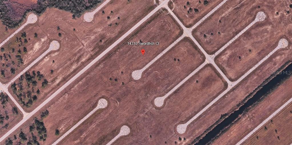This is an aerial map view of a vacant residential lot in a subdivision — 14310 SWORDFISH COURT, PLACIDA, FL
