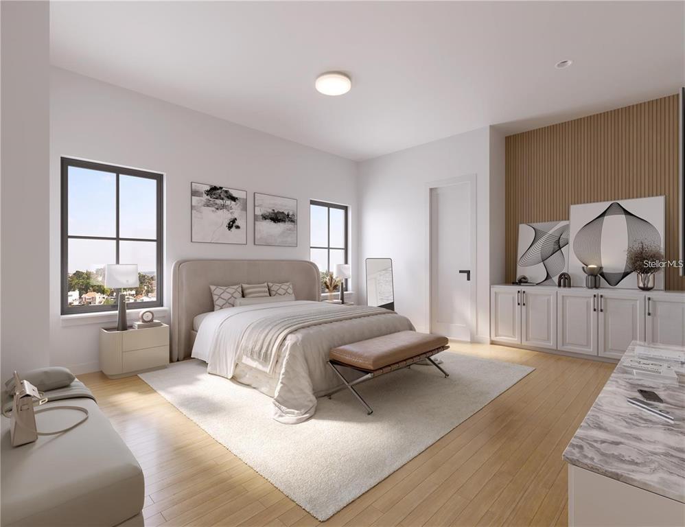 This is a rendering of a modern bedroom featuring a bed, wood-paneled wall, and cabinetry — 611 SIGLER DRIVE, WINTER GARDEN, FL