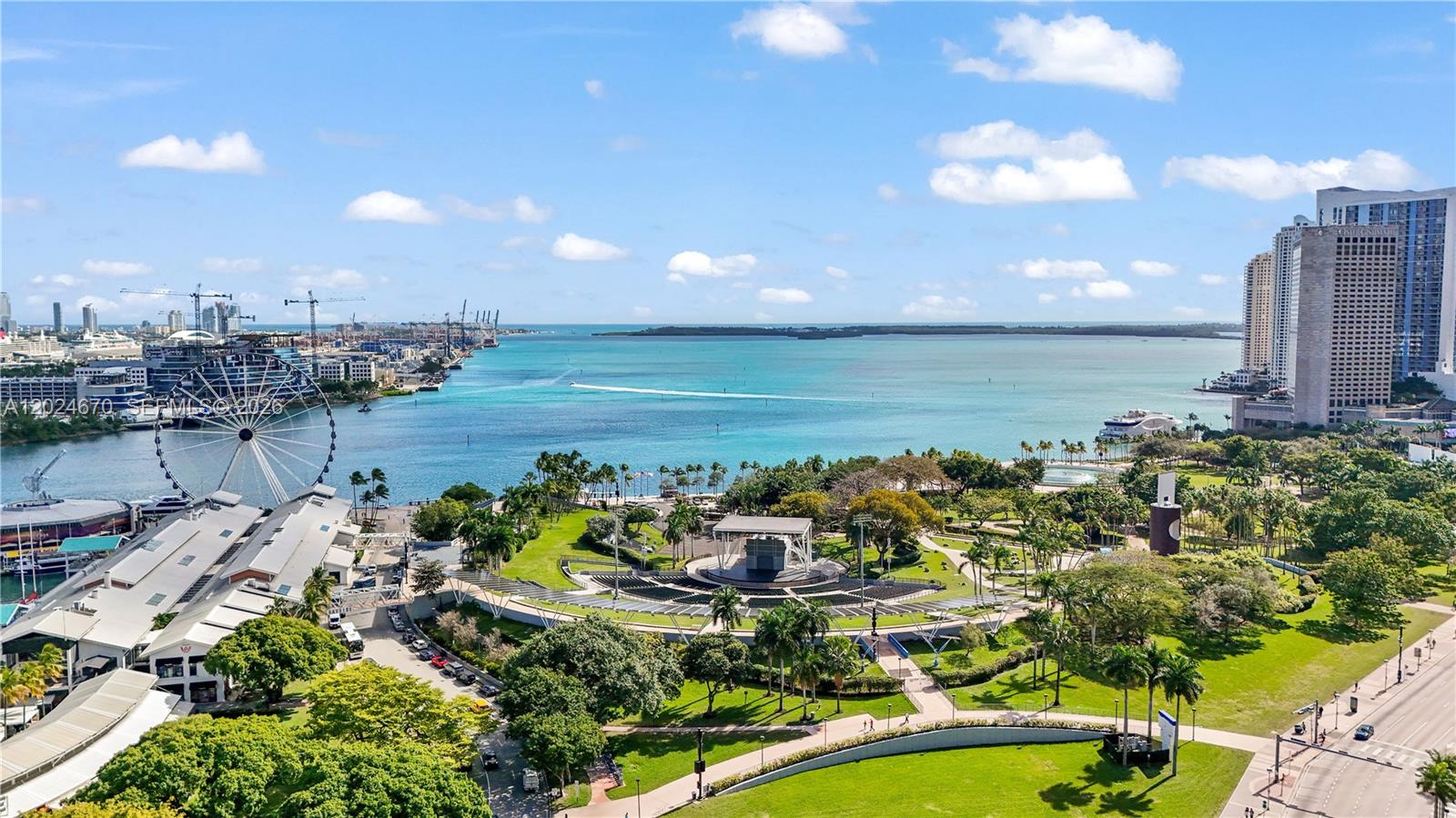 An aerial view shows a park with an amphitheater, a Ferris wheel, and a bay — 398 NE 5th St # 2310, Miami FL 33132, MIAMI, FL