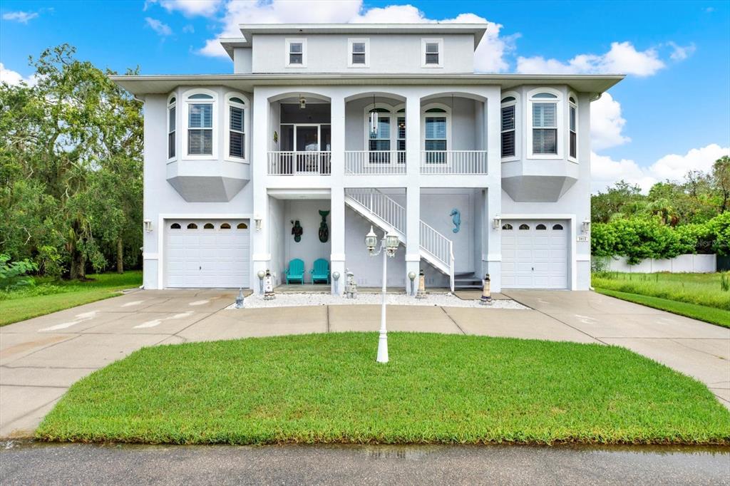5413 TROPICAL WOODS COURT