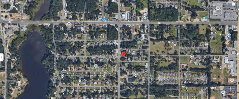 This is an aerial map view of a residential neighborhood with a red location pin — 242 N HIGHWAY 22 A, PANAMA CITY, FL