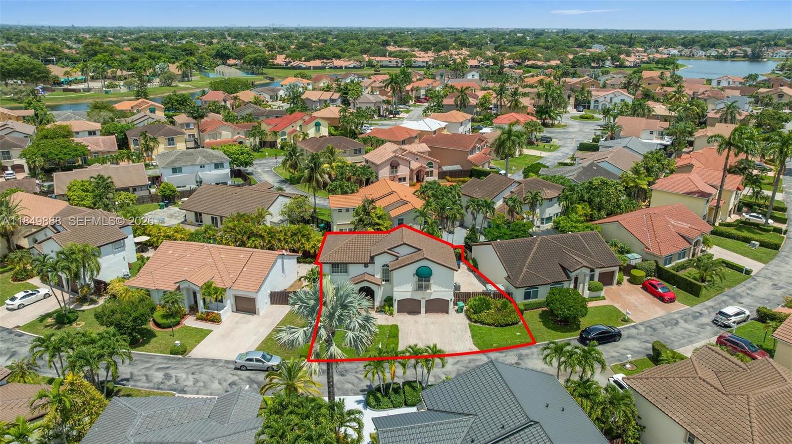 An aerial view shows a two-story suburban house highlighted by a red border — 4471 SW 154th Ct, Miami FL 33185, MIAMI, FL