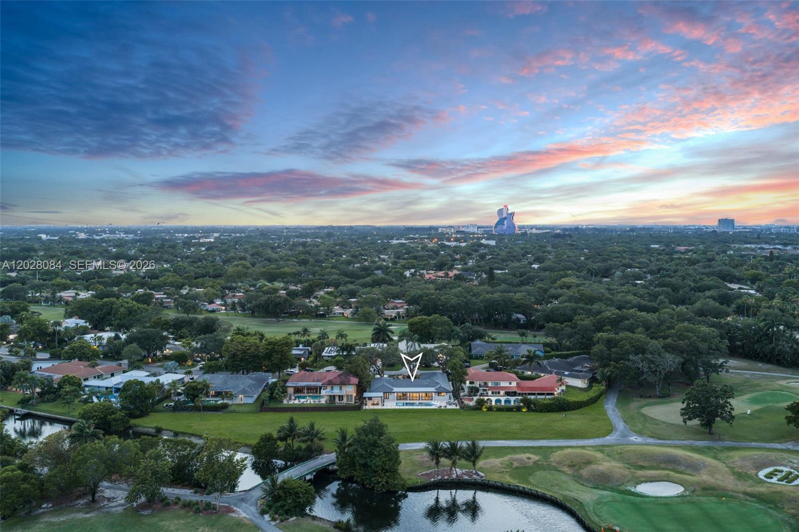 An aerial view shows a residential house with a pool overlooking a golf course — 4220 Casper Ct, Hollywood FL 33021, HOLLYWOOD, FL