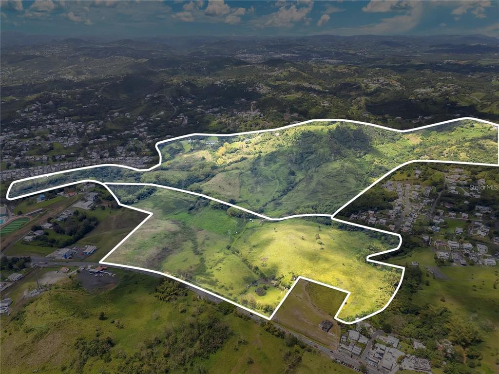 An aerial view shows a large, hilly plot of land outlined in white — 7786 BO BEATRIZ KM 0.5, CAYEY, PR