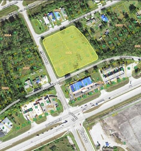 This aerial map shows a highlighted vacant land parcel located at a street intersection — 3700 BAYSWATER DRIVE, PUNTA GORDA, FL