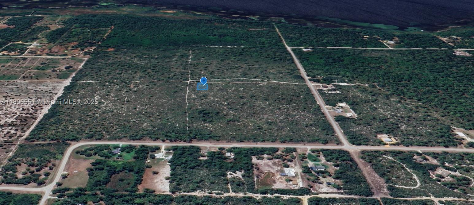 This is an aerial view of a large, undeveloped rectangular plot of land — 700 Watterson, Lake Placid FL 33852, LAKE PLACID, FL