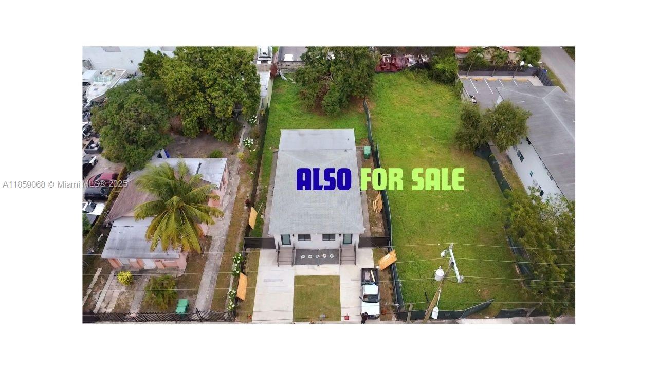 An aerial view shows a house with a large grassy lot and a paved driveway — 683 NW 30th St, Miami FL 33127, MIAMI, FL