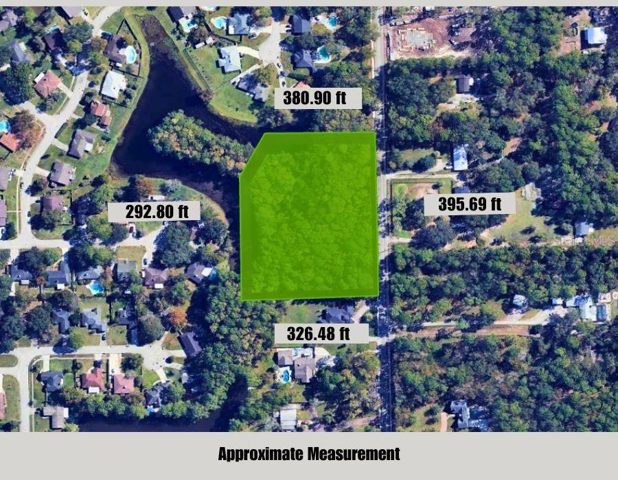 An aerial map shows a green-highlighted plot of land with its approximate boundary measurements — MARBON ROAD, JACKSONVILLE, FL