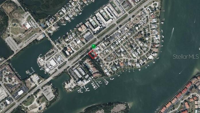 An aerial map view shows a highlighted property lot located in a coastal residential area — 102 DESOTO DRIVE, NEW SMYRNA BEACH, FL