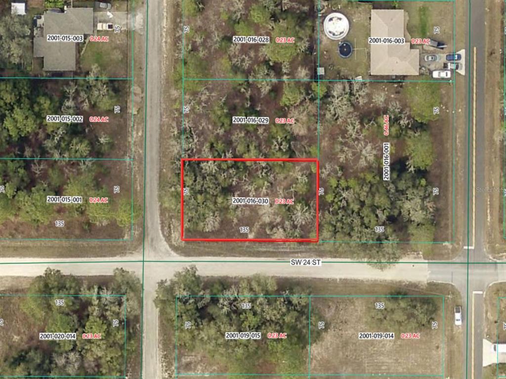 This is an aerial map showing a vacant rectangular lot outlined in red — SW 141ST COURT, OCALA, FL