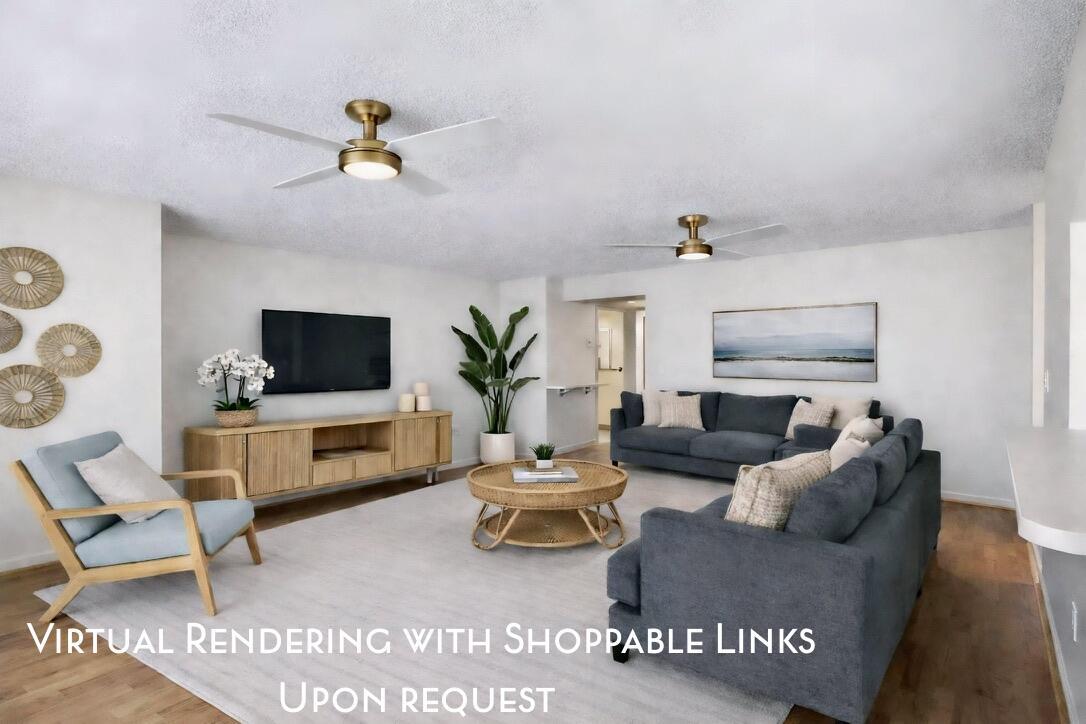 This virtual rendering shows a living room with two ceiling fans, blue sofas, and wood furniture — 110 Half Moon Circle # C1, Hypoluxo FL 33462, HYPOLUXO, FL