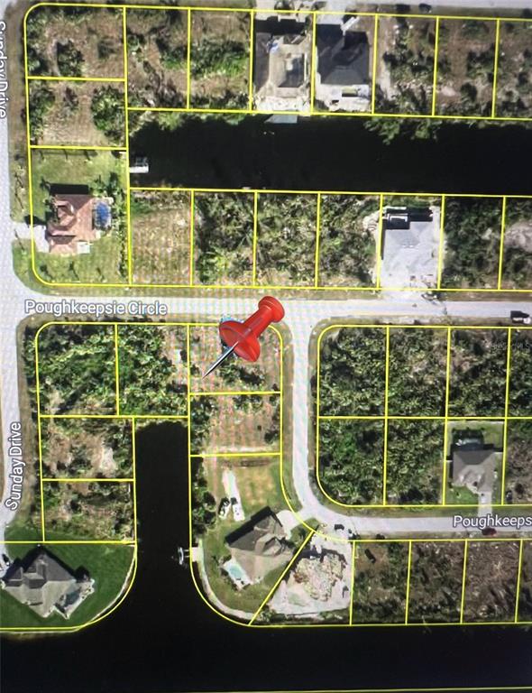 This aerial map shows residential lots along a canal and Poughkeepsie Circle — 10471 POUGHKEEPSIE CIRCLE, PORT CHARLOTTE, FL