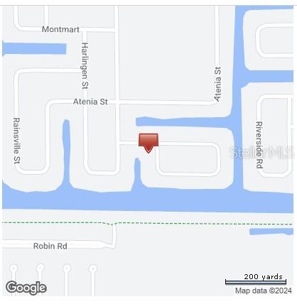 This is a map showing a residential neighborhood with a red marker indicating a location — 10471 POUGHKEEPSIE CIRCLE, PORT CHARLOTTE, FL