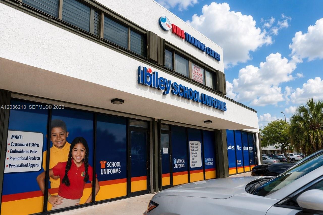 The exterior of a commercial building features signage for a school uniform store and training center — 4355 W 16th Ave, Hialeah FL 33012, HIALEAH, FL