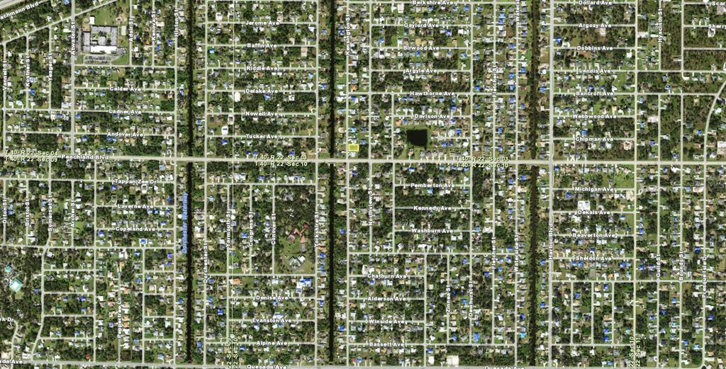 This is an aerial map view showing a residential neighborhood grid with a highlighted lot — 520 KENSINGTON STREET, PORT CHARLOTTE, FL