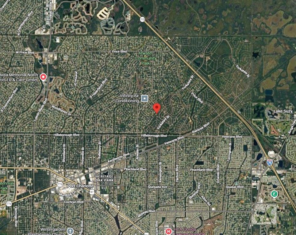 This is a satellite map view of a residential area in Port Charlotte, Florida — Lot 13 SERNICE STREET, NORTH PORT, FL