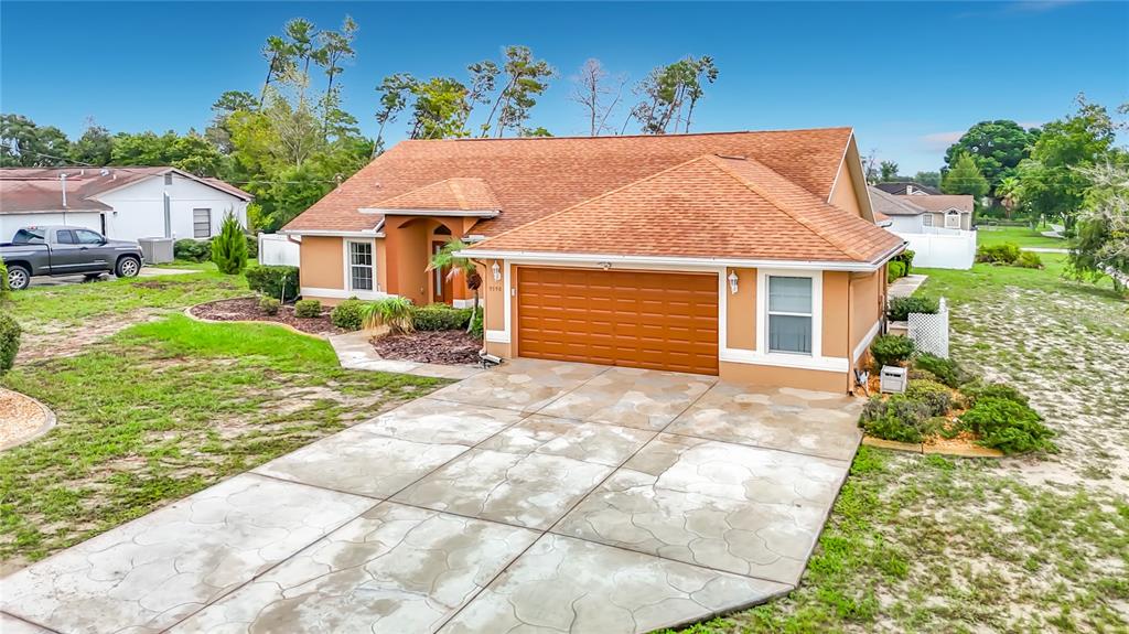 9590 ELGIN BOULEVARD, SPRING HILL, FL — photo 3 of 30