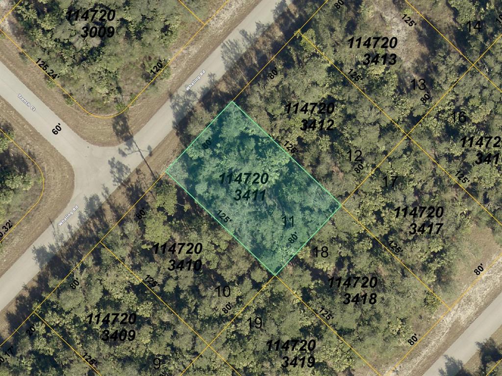 An aerial map shows a highlighted rectangular plot of land surrounded by wooded residential lots — 0 WHALING ROAD, NORTH PORT, FL