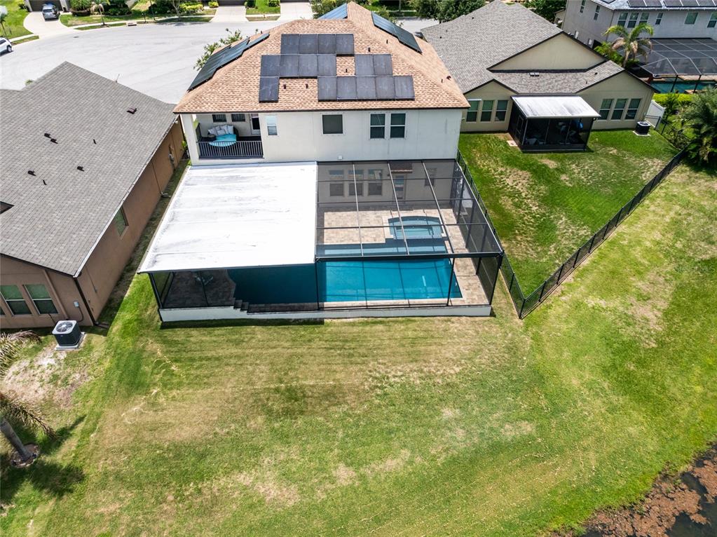 This is a floor plan of a house featuring a garage, pool, and screened porch — 11807 CROSS VINE DRIVE, RIVERVIEW, FL
